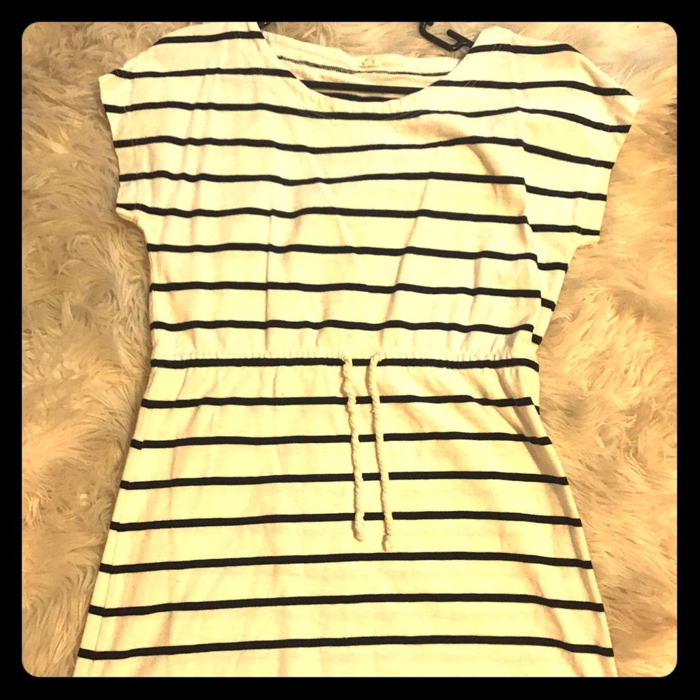 A JCREW dress. White with black stripe and a tie